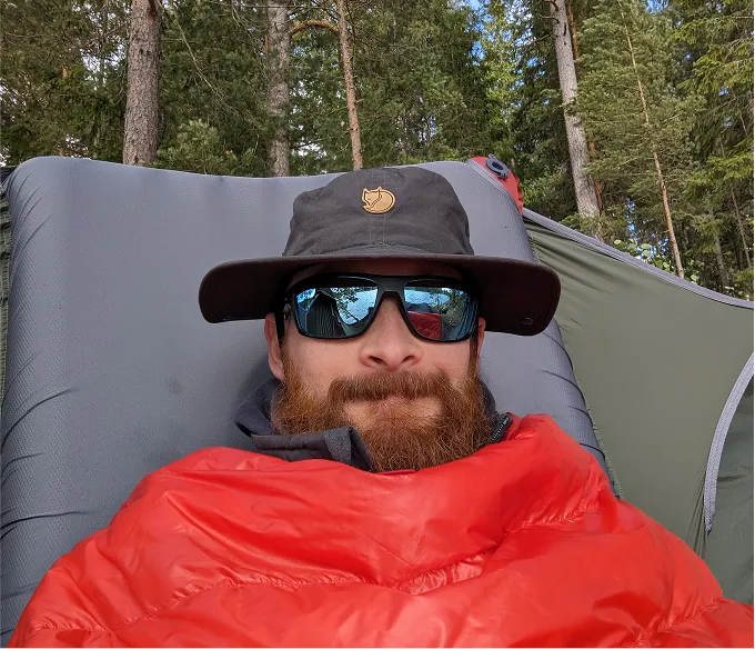 Selfie cozied up sitting in a hammock in Sweden.